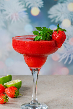 Frozen strawberry daiquiri with white rum garnished with fresh fruit