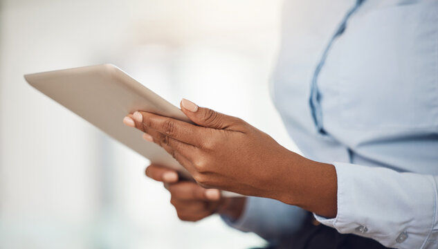 Hands Of Business Woman Working On A Tablet Analyzing Annual Company Data Or Information For Marketing Campaign. Professional Black Girl With Digital Mobile Tech For Research On Consumer Sales Trends