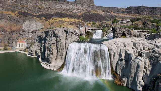 Twin Falls Idaho Snake River Waterfall brink rainbow. Waterfall on the Snake River, Idaho. Irrigation and hydroelectric power stations is economic impact to west. higher than Niagara Falls. Travel.