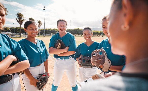 Team Of Women Baseball Players, Given Strategy And Motivation By Coach To Win Game. Winning In Sport Means Leadership, Teamwork And Pride As Well As Healthy Competition For Group Victory In Softball