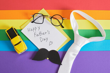 Happe fathers day, tie, trendy funny glasses, toy car, pen, mocap notebook and mustache, father's day concept