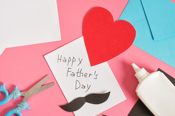 do-it-yourself father's day card, red paper heart with mustache, card for dad or grandfather