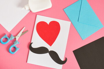 do-it-yourself father's day card, red paper heart with mustache, card for dad or grandfather