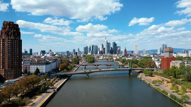 Aerial drone view of Frankfurt city, Main river and bridge, business centres and skyscrapers, Germany