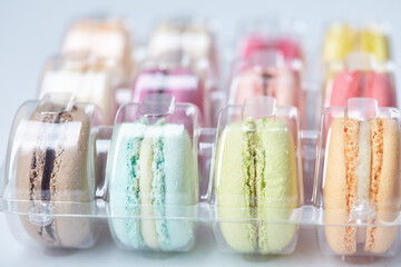 tasty macaroons on the white background