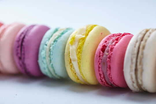 tasty macaroons on the white background