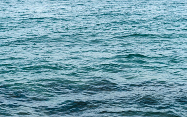 Obraz premium Dark blue ocean surface covered with waves