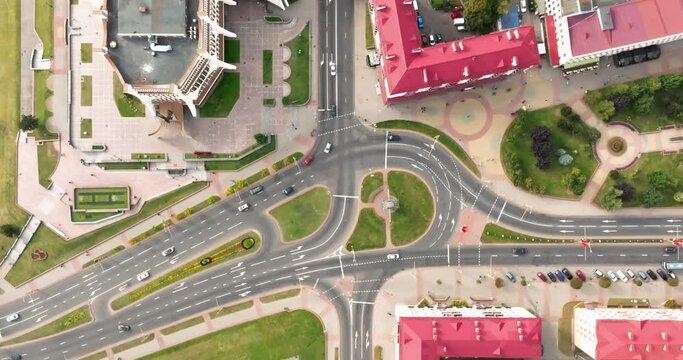 accelerated video 3x aerial view above on road junction with heavy traffic in city
