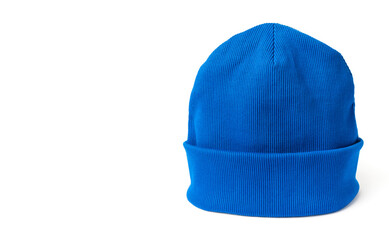 Electric blue beanie hat made from natural eco-fabric in ribbed. Isolation on a white background. Side view. Copy space