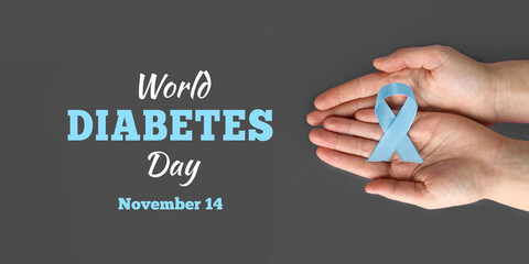 World Diabetes day. Blue circle in hands of an adult is symbol of diabetes awareness. 14 november