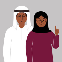 Smiling muslim couple, good mood concept. Positive emotions, happy people, man and woman showing thumbs up, fun and joy.