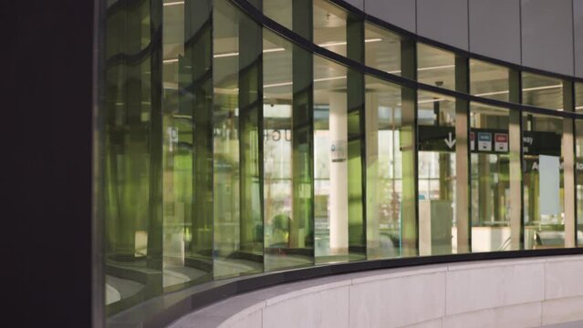 Modern architecture contemporary curved glass wall of transit station