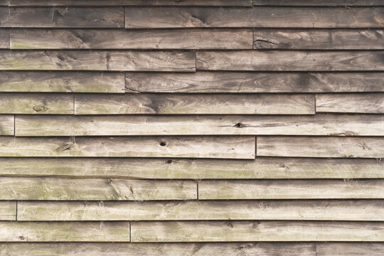Rustic wood cladding texture, horizontal unpainted old wood planks background