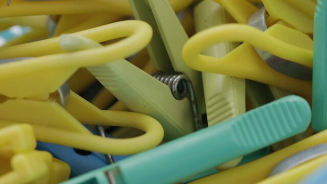 colored clothespins rotate in a circle