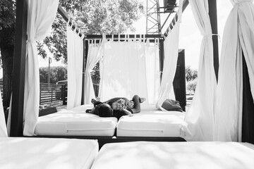 father and son lie down on the baldachin © Miss Alva