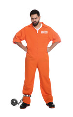 Prisoner in jumpsuit with metal ball on white background