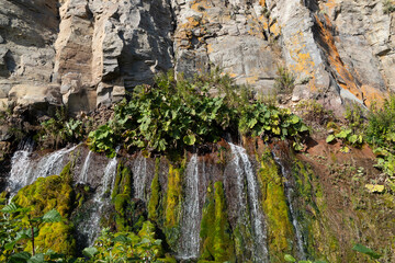 Rock with waterfalls, Iturup Island, South Kuriles