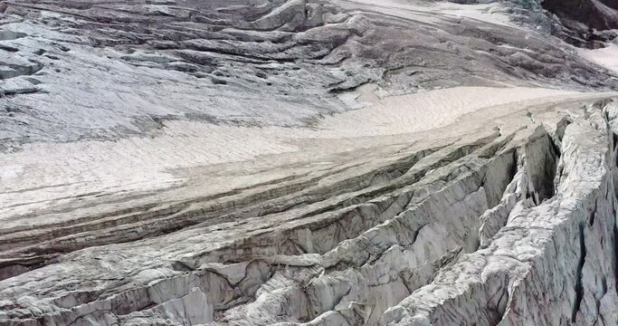 Drone flight over the slowly dying Steingletscher in the Sustenpass region of the Swiss Alps at 2'800m in Switzerland.