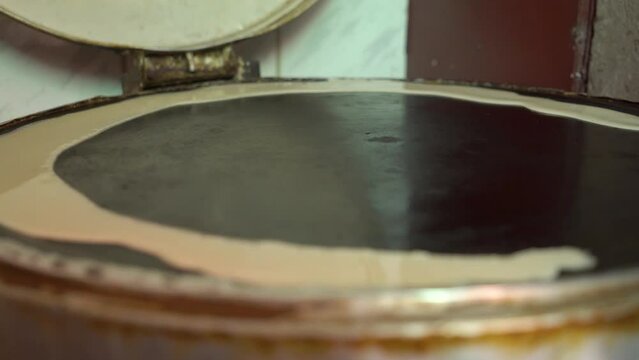 Cooking process of the traditional Ethiopian injera bread, Ethiopia