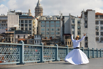 Sufi Whirling Silhouette and Istanbul Icons, Galata Bridge Eminonu, Istanbul / Turkey	