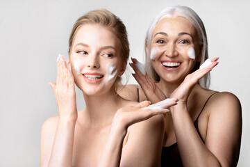 Women of different ages take care of their skin  washing faces by cleansing cosmetics product....