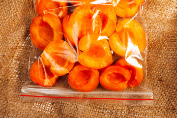 apricot halves in a burlap bag