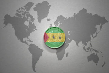 euro coin with national flag of sao tome and principe on the gray world map background.3d illustration.