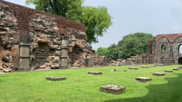 The interior old and ruined walls of the Baradwari Mosque located in Maldah region of West Bengal, India.