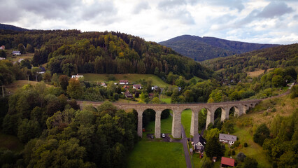 Fototapeta na wymiar Railroad viaduct in Novina, Kryštofovo údolí, Liberec, Czech Republic 