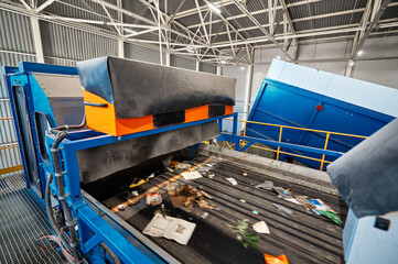 Production line with conveyors at waste recycling plant