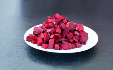 Fresh finely chopped beets on a plate