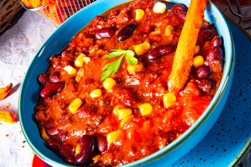 chili con carne with sweet potato and spicy nachos
