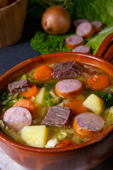 Delicious savoy cabbage stew in a rustic bowl