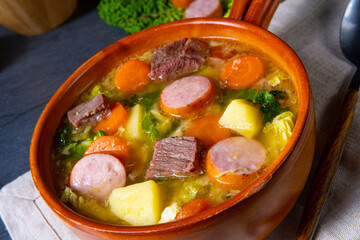 Delicious savoy cabbage stew in a rustic bowl