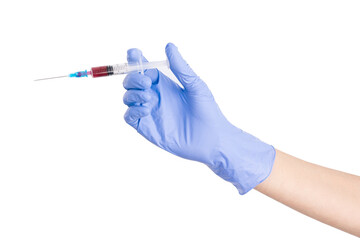 Hand with blue nitrile glove is holding syringe with red liquid, in front of white background. Blood in syringe. Medical syringe with dark liquid. Drugs. Vitamins. Medicines.