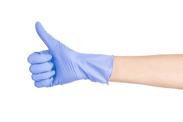 A hand in a medical glove shows a gesture of class! The medicine. Female hand isolated on white background. White woman's hand showing symbols and gestures. Thumb up.