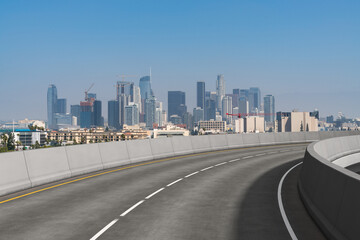 Plakat Empty urban asphalt road exterior with city buildings background. New modern highway concrete construction. Concept of way to success. Transportation logistic industry fast delivery. Los Angeles. USA.