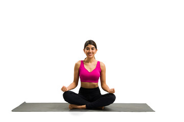 Smiling latin woman meditating during yoga exercises