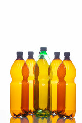 Ecology Concepts. Variety of Empty Colorful Plastic Garbage Bottles In Line Together Over White Background