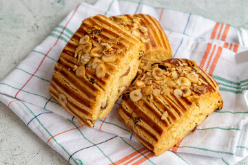 İstanbul cookies. Cookies with hazelnuts and raisins on a gray background. close up
