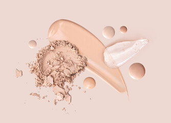 cosmetic smear foundation cream powder on a beige background