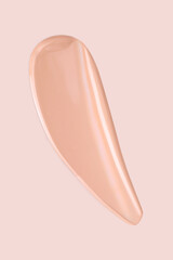 cosmetic smear foundation cream foundation on a beige background