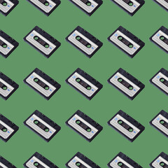 Seamless pattern of audio cassettes on a green background. Retro gadgets.