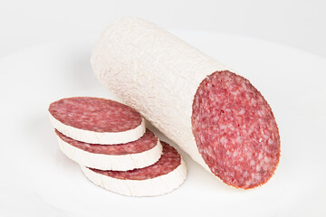 Sausage slices on a white background, salami.