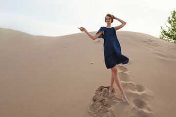  Romantic girl posing sandy dunes