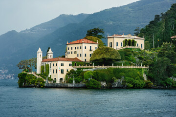 View from water to picturesque Villa Balbianello in Lenno, on Lake Como, Italy, famous place used...