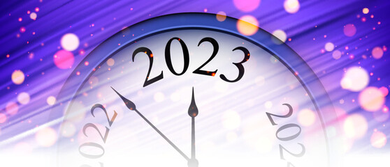 Obraz na płótnie Canvas Half hidden clock showing 2023 on purple brushstrokes background.