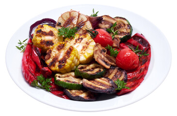 Grilled vegetables mix on a ceramic plate - zucchini eggplant onions corn mushroom tomato