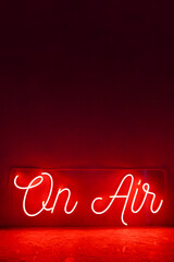 Red neon sign on air. Trendy style. Neon sign. Custom neon. Home decor.