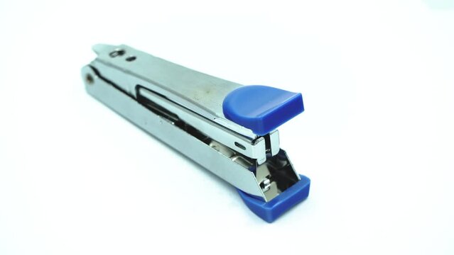 Office supplies rotating on a white background